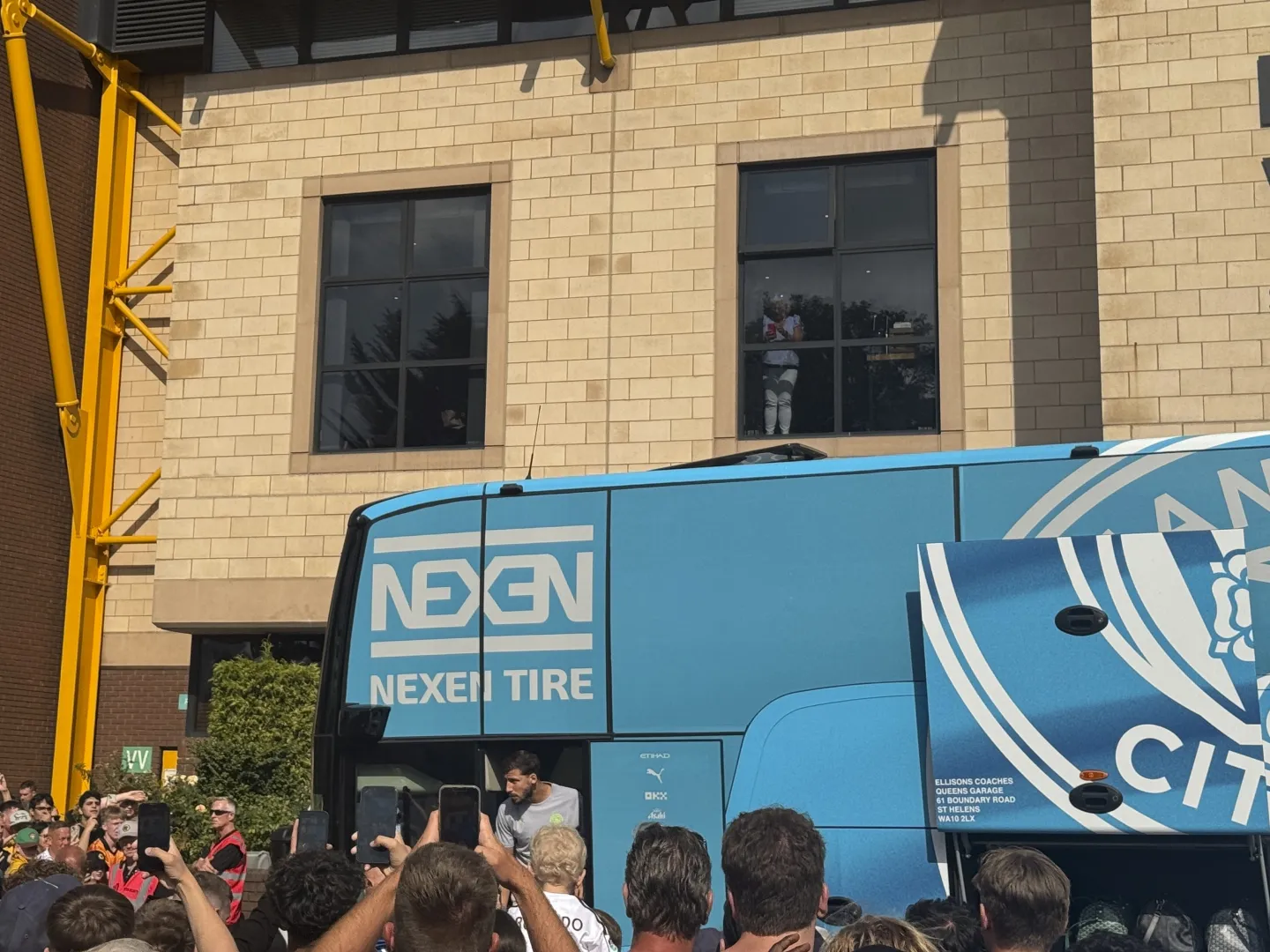 Manchester City’s team bus arriving before an away match.